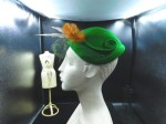 green felt hat feather main